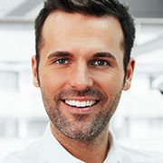 man smiling with white smile