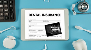 Dental insurance form displayed on electronic tablet