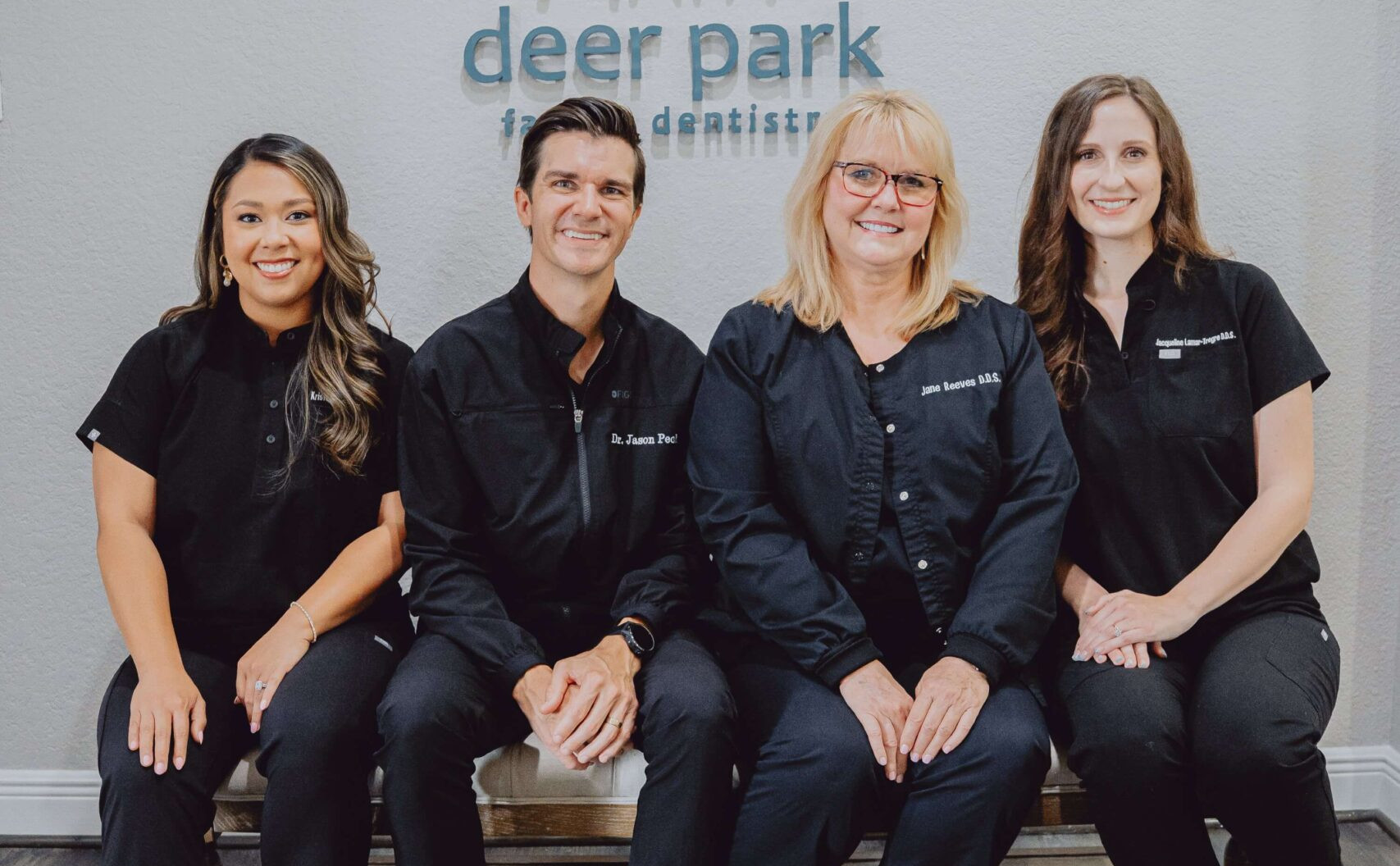 Smiling dental team group photo inside clinic – Deer Park Family Dentistry